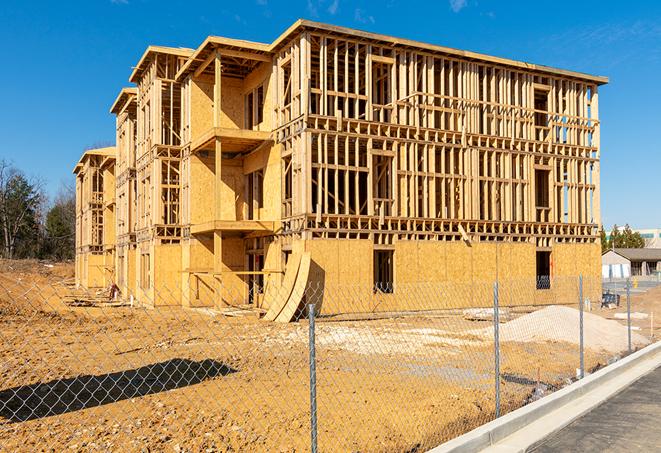 a snapshot of temporary chain link fences protecting a large construction project from unauthorized access in Maple Valley